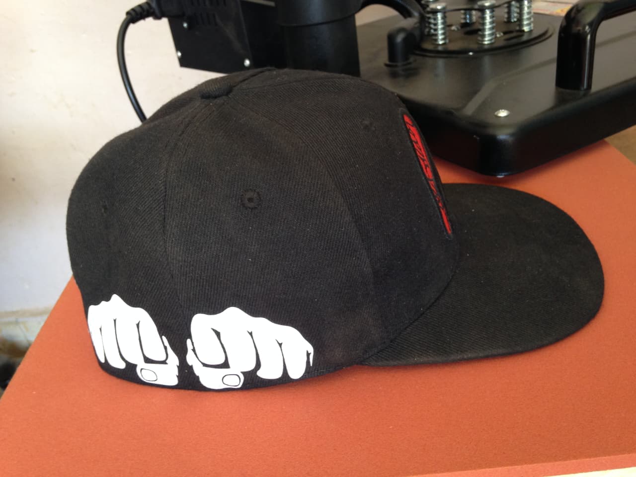 Black Cap with Fist Design